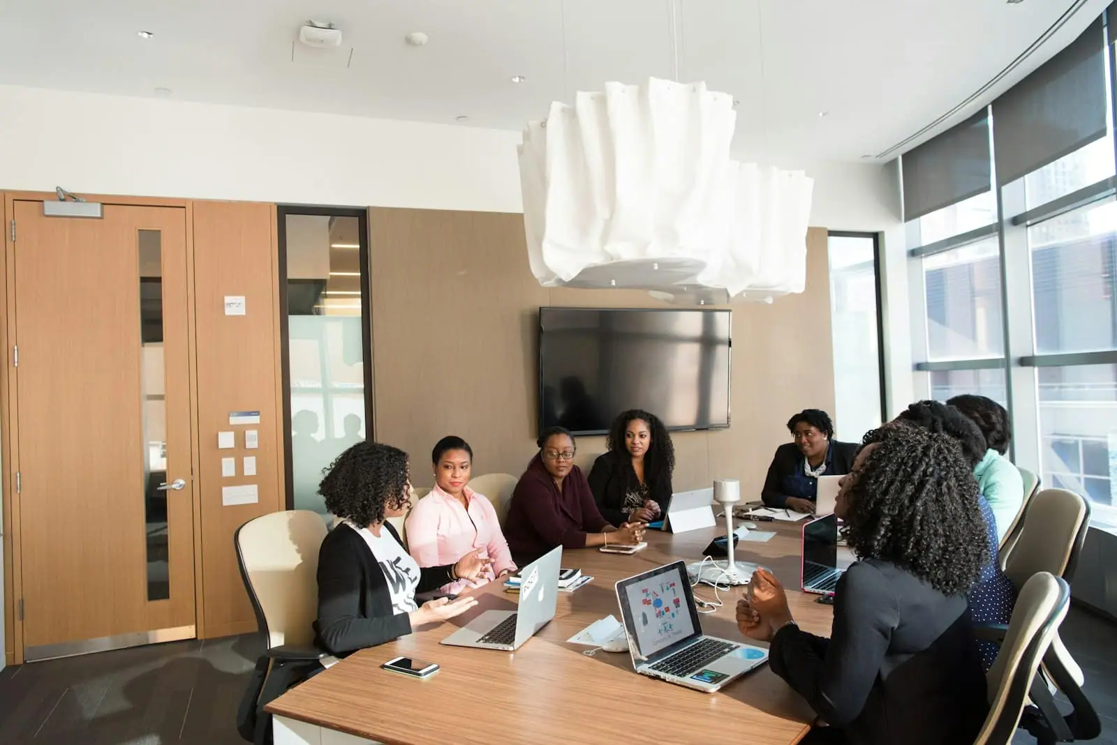 A diverse team of technologists in a meeting